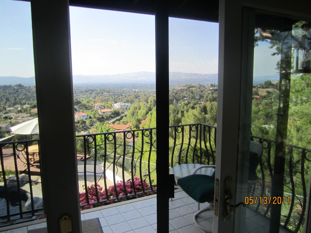 Interior View Double Sliding Screen Doors in Master Bedroom Installed inThousand Oaks | mobile scren service installing screen doors in thousand oaks