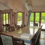 Double Set of Arched Screen Doors in Kitchen