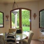 Double Set of Arched Screen Doors in Kitchen