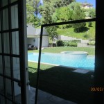 New window screens overlooking pool