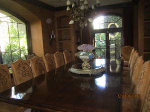 Arched window panels installed in dinning room | Brentwood Arched Window and Doors