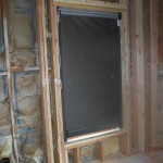 Dropped down Motorized Power Screens installation side view windows | Santa Barbara Motorized Power Screens