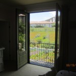 Open set of retractable screen doors in Topanga | Topanga Screens