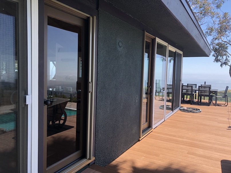 Single disappearing screen door exterior application | Every retractable screen door is designed and custom built to reflect each client’s personal wants and needs.